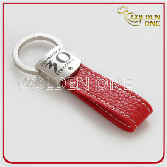 Forma ovalada antigua oro en relieve metal y llave de cuero fob